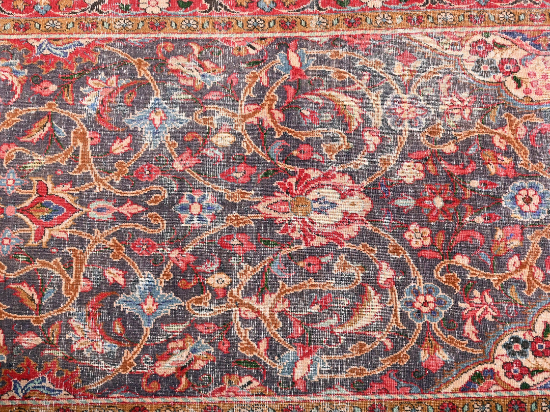 a large oriental rug with a floral design