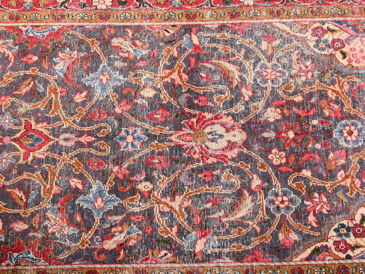 a large oriental rug with a floral design