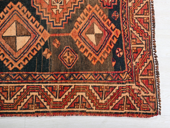 a rug with a design on the middle of it