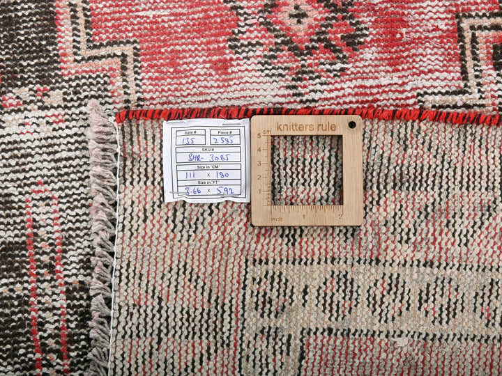 a close up of a piece of cloth with a ruler on it