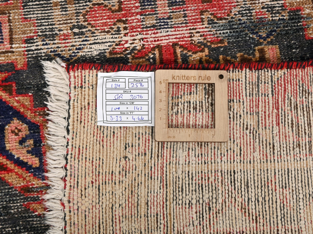 a piece of wood sitting on top of a rug