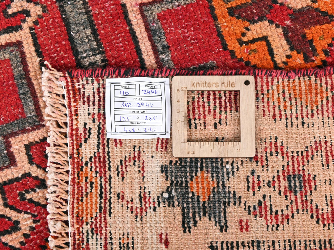 a piece of wood sitting on top of a rug