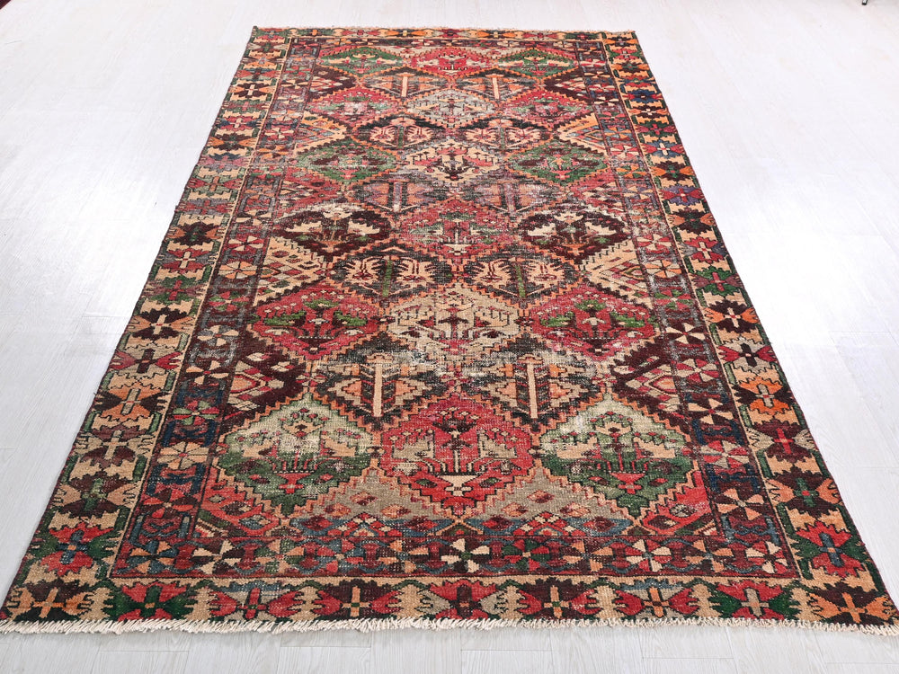 a large oriental rug on a white floor