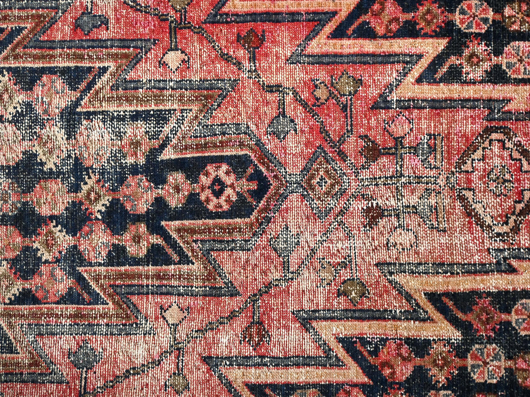 an oriental rug with many different colors and patterns
