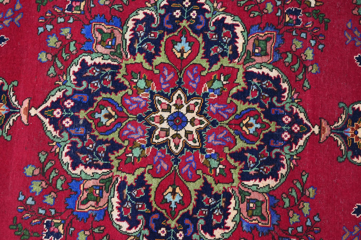 red Large rug 6' 7" x 9' 3"