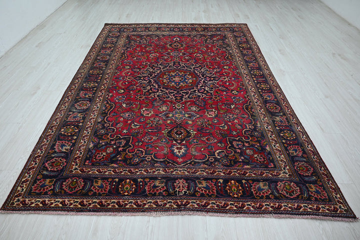 red Medium rug 6' 5" x 9' 4"