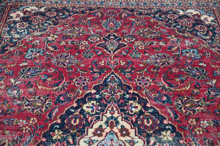 red Medium rug 5' 10" x 9' 0"