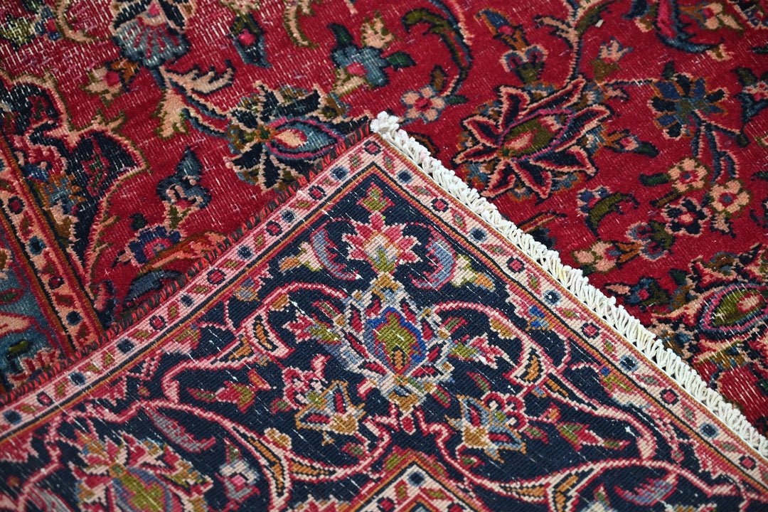 red Medium rug 5' 10" x 9' 0"