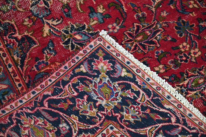 red Medium rug 5' 10" x 9' 0"