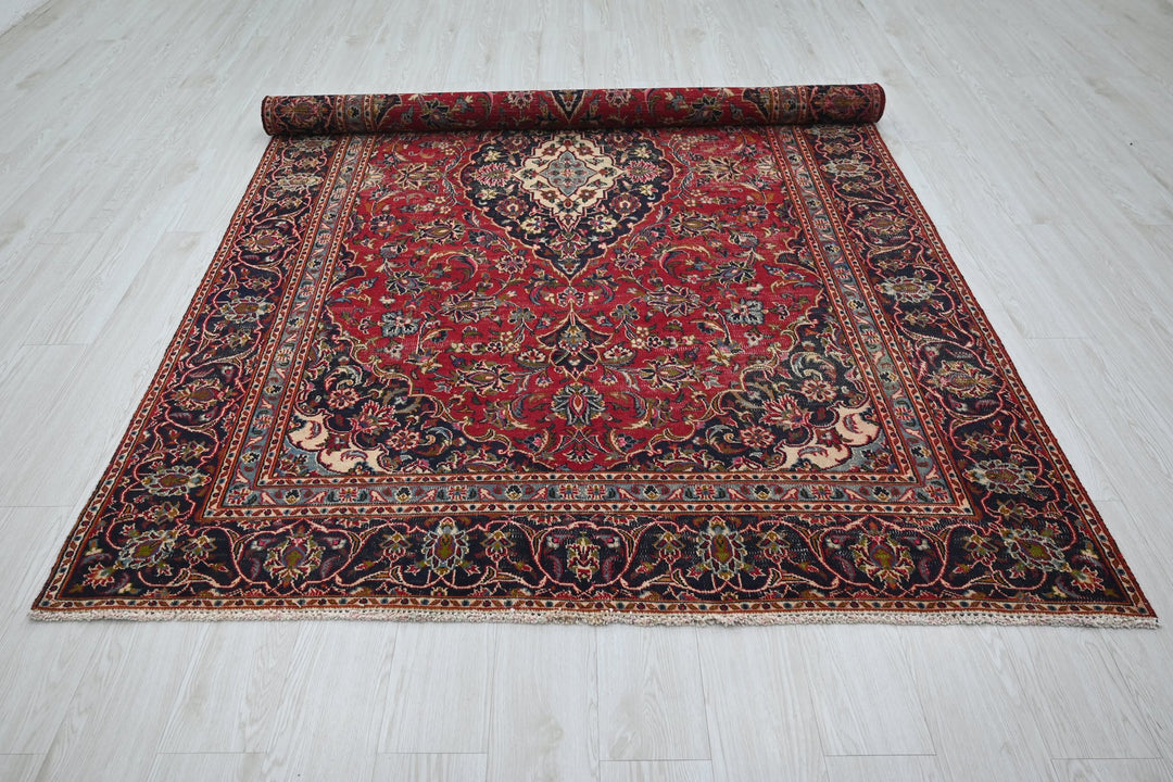 red Medium rug 5' 10" x 9' 0"