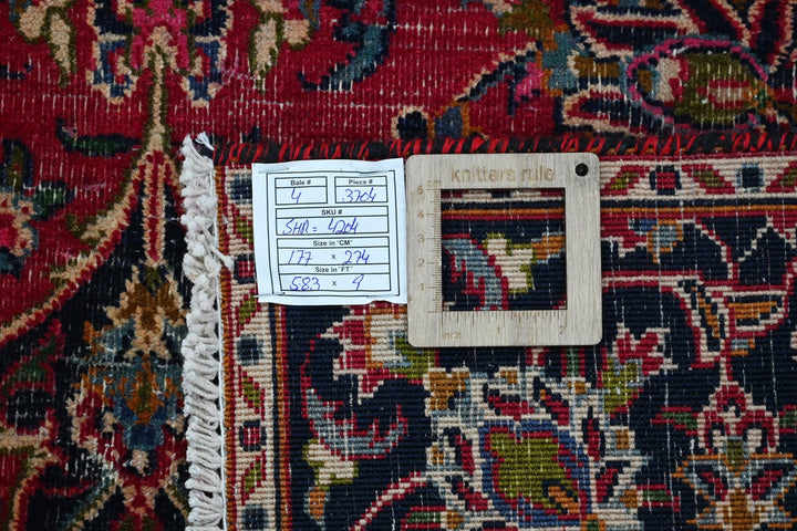 red Medium rug 5' 10" x 9' 0"