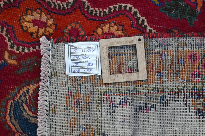 red Medium rug 6' 1" x 9' 3"