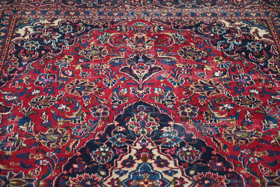 red Medium rug 6' 3" x 9' 0"