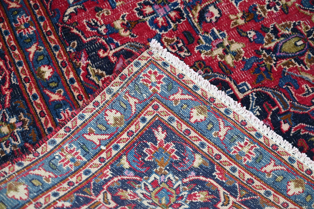 red Medium rug 6' 3" x 9' 0"