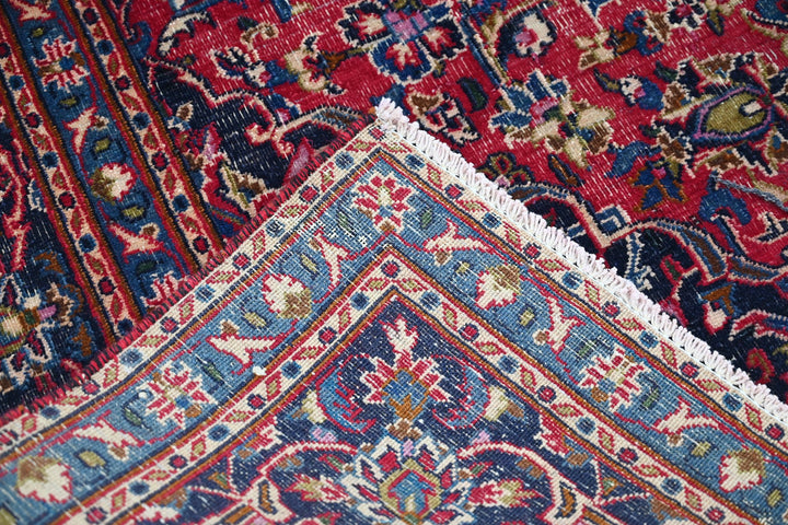 red Medium rug 6' 3" x 9' 0"