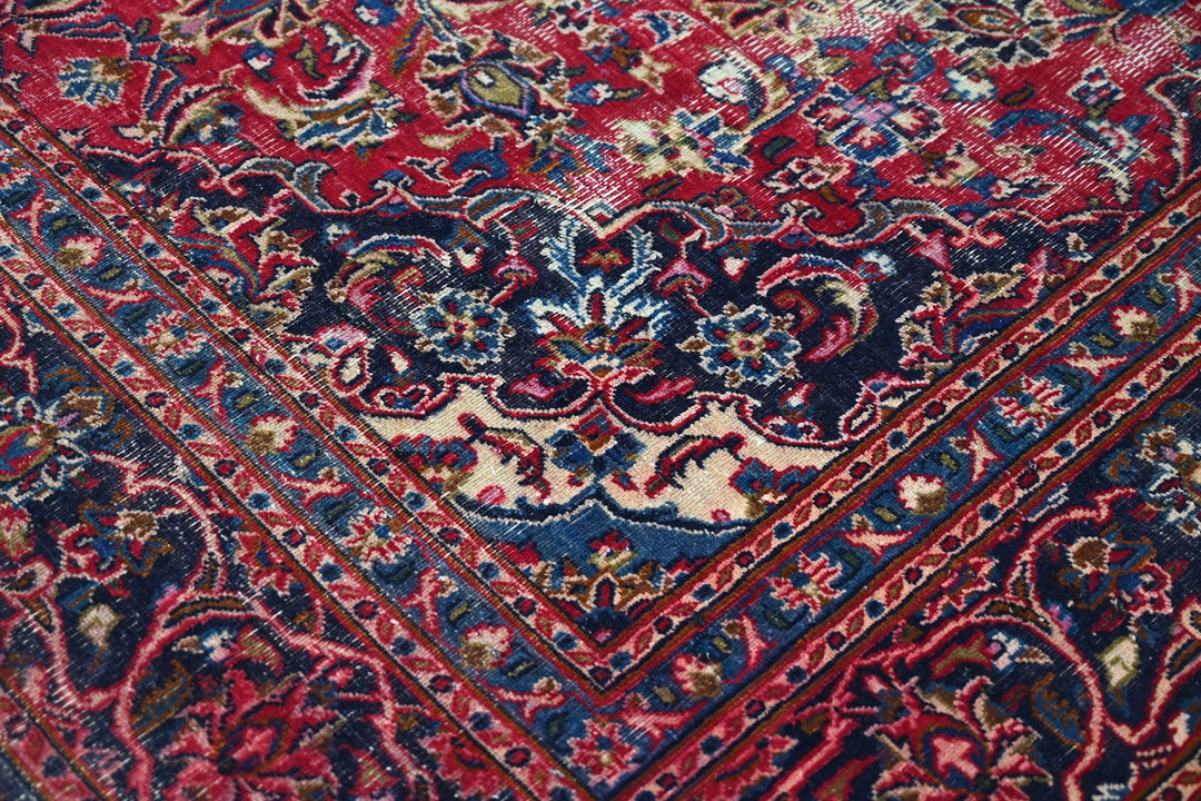 red Medium rug 6' 3" x 9' 0"