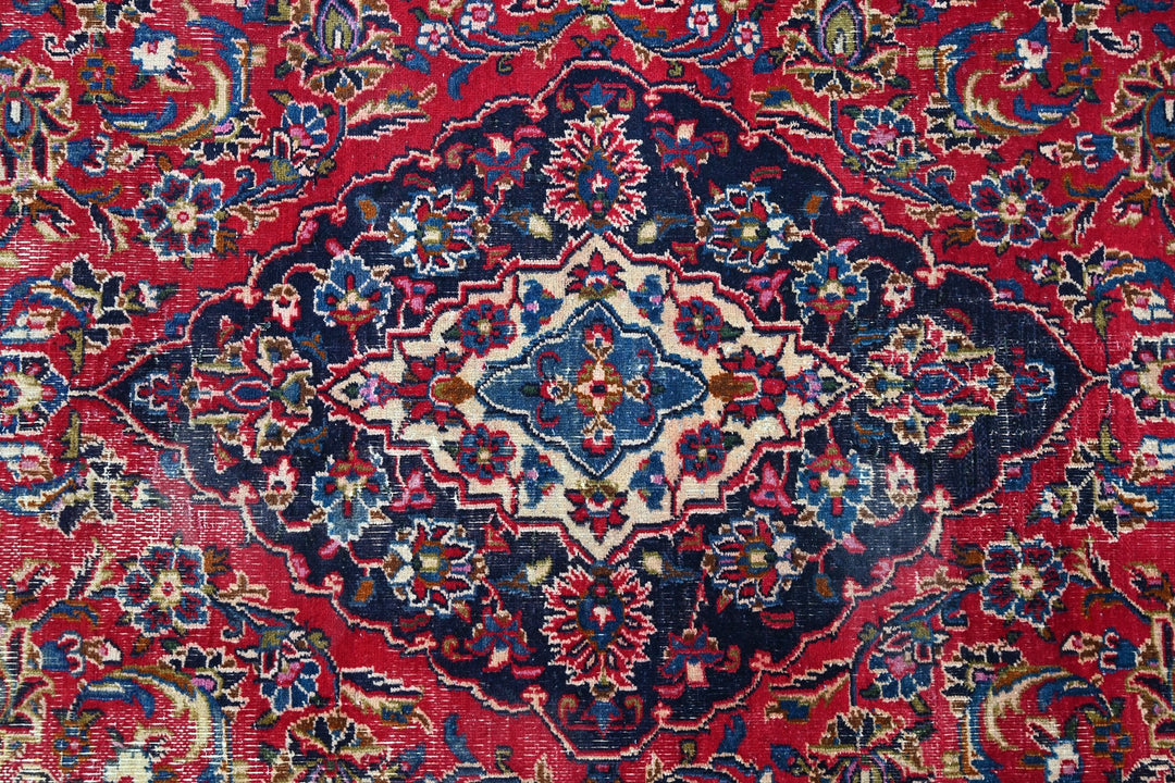 red Medium rug 6' 3" x 9' 0"