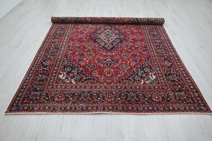 red Medium rug 6' 3" x 9' 0"