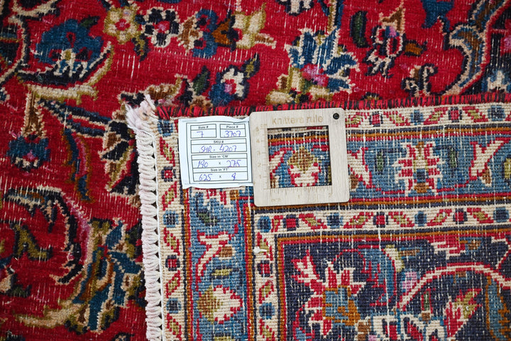 red Medium rug 6' 3" x 9' 0"