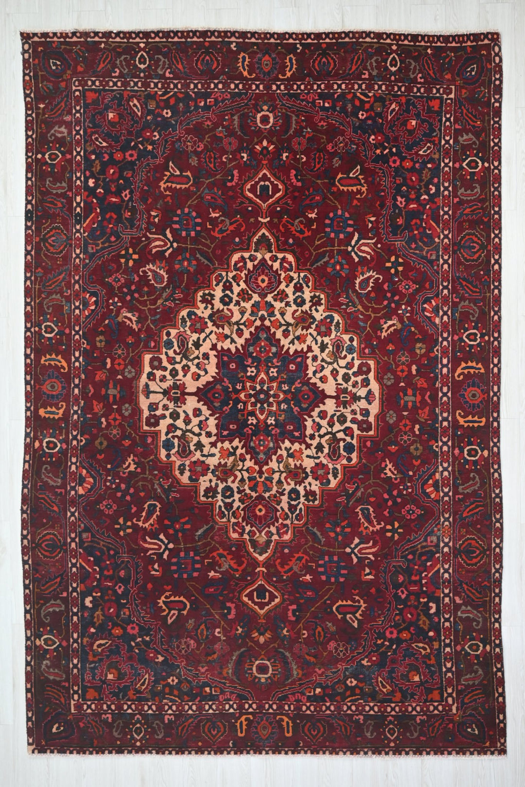 red Large rug 7' 0" x 10' 6"