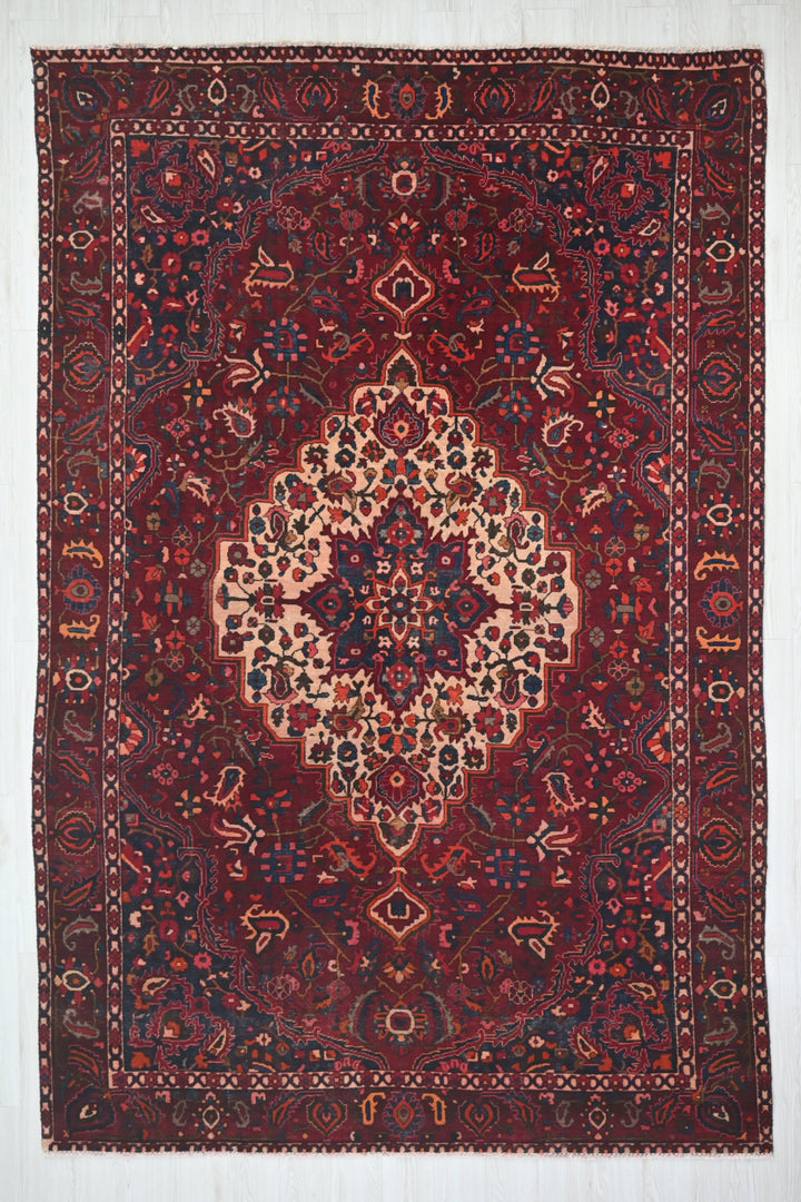 red Large rug 7' 0" x 10' 6"
