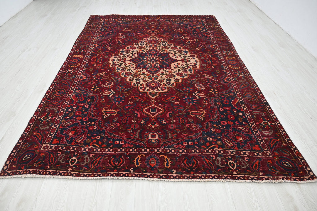 red Large rug 7' 0" x 10' 6"