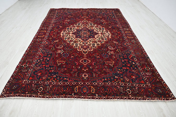 red Large rug 7' 0" x 10' 6"