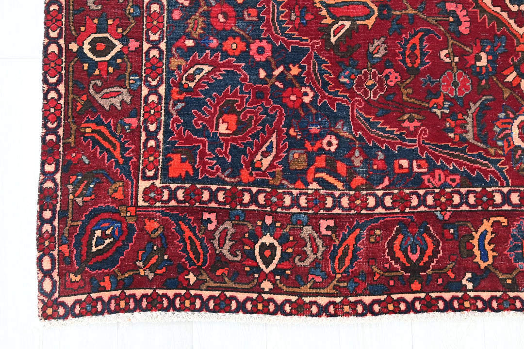 red Large rug 7' 0" x 10' 6"