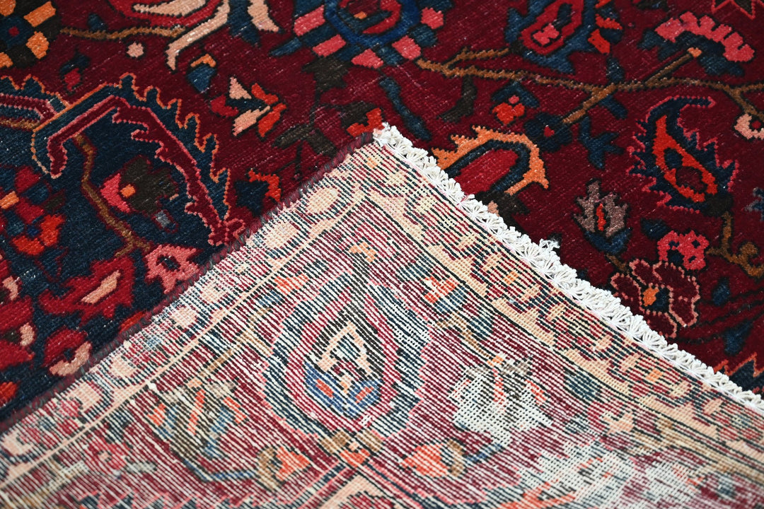 red Large rug 7' 0" x 10' 6"