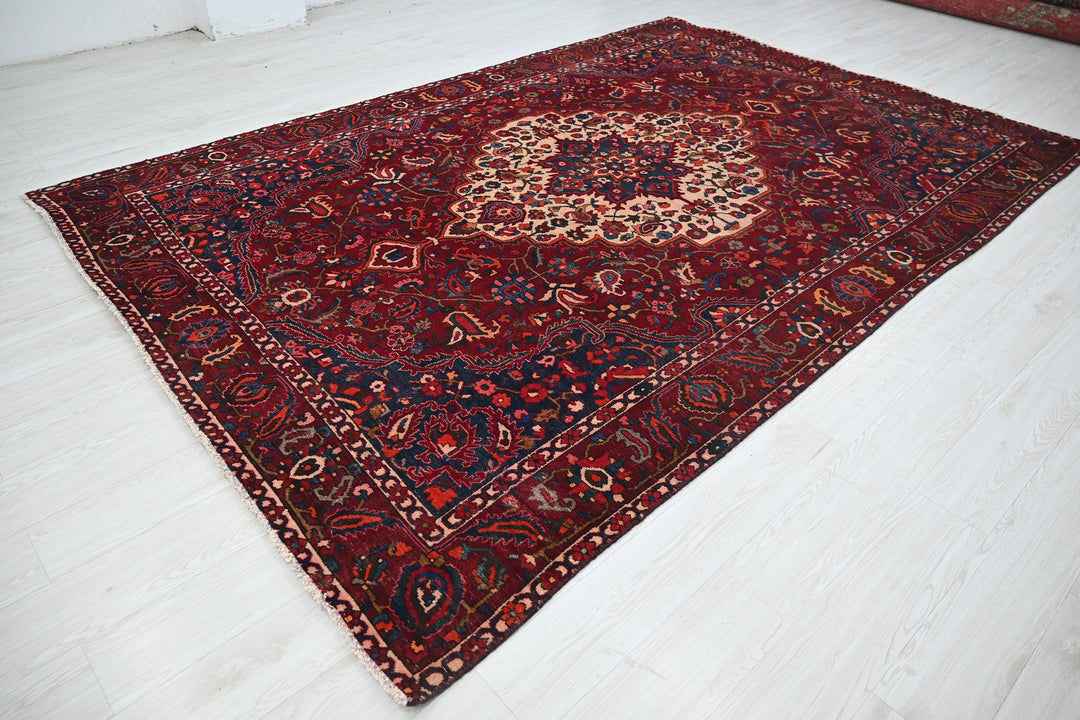 red Large rug 7' 0" x 10' 6"