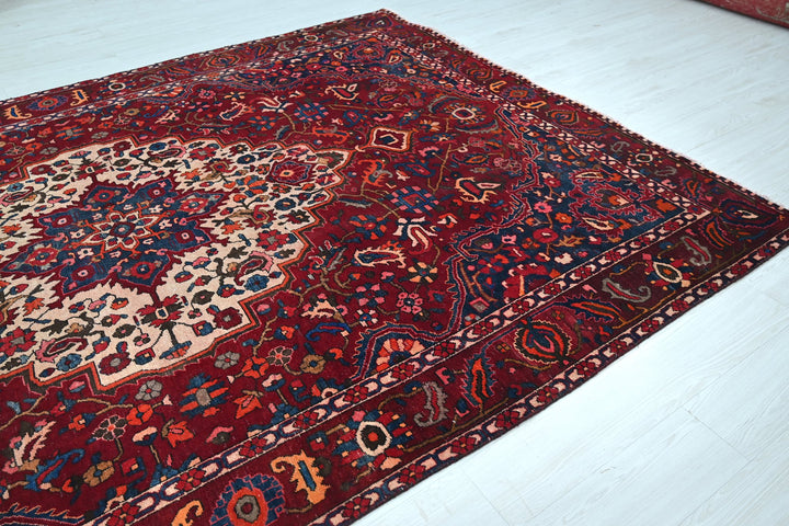 red Large rug 7' 0" x 10' 6"