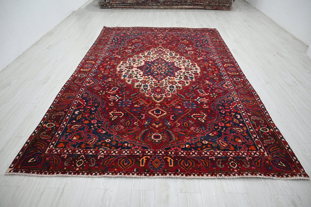 red Large rug 7' 0" x 10' 6"