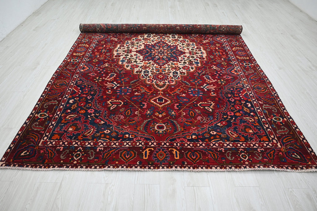 red Large rug 7' 0" x 10' 6"
