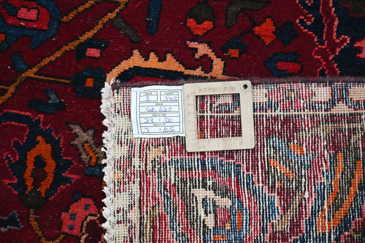 red Large rug 7' 0" x 10' 6"