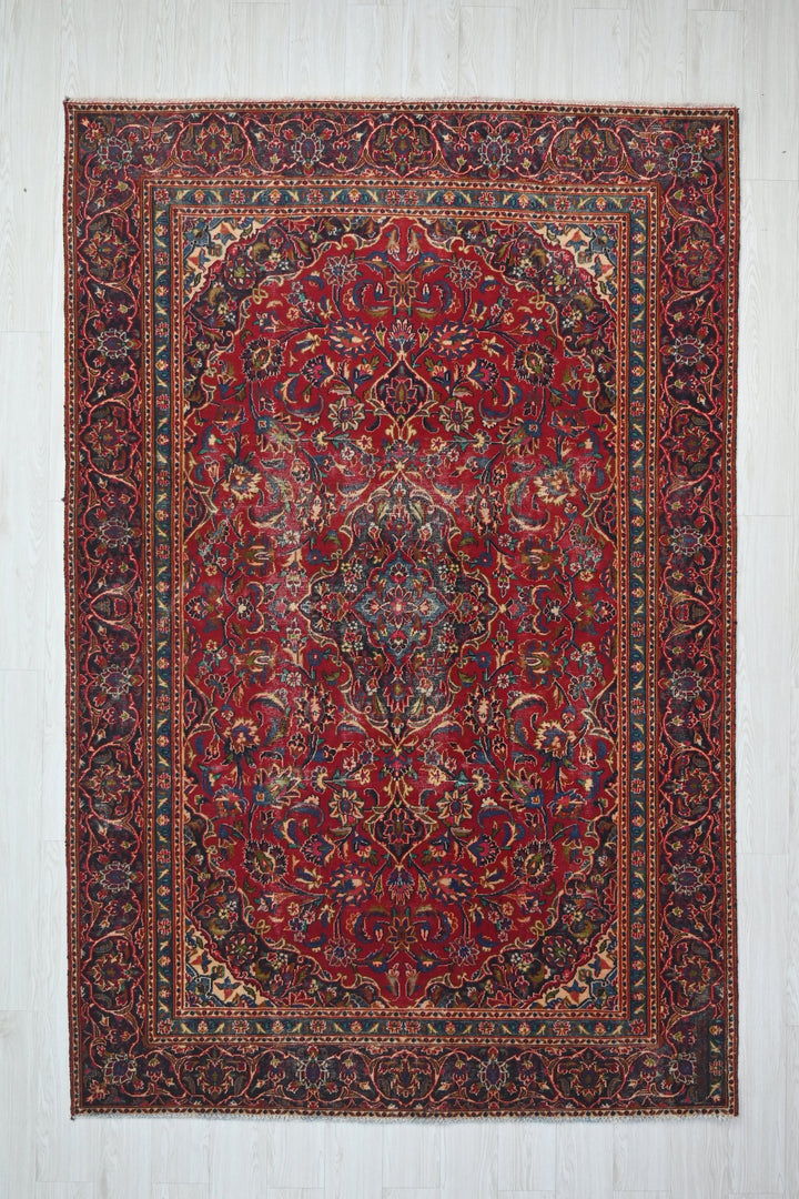 red Medium rug 5' 10" x 9' 0"