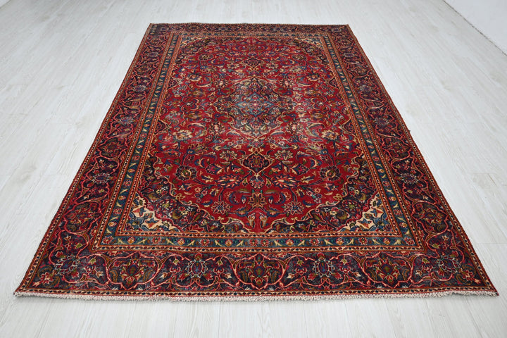 red Medium rug 5' 10" x 9' 0"