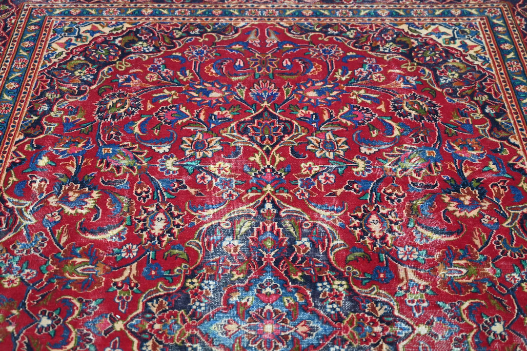 red Medium rug 5' 10" x 9' 0"