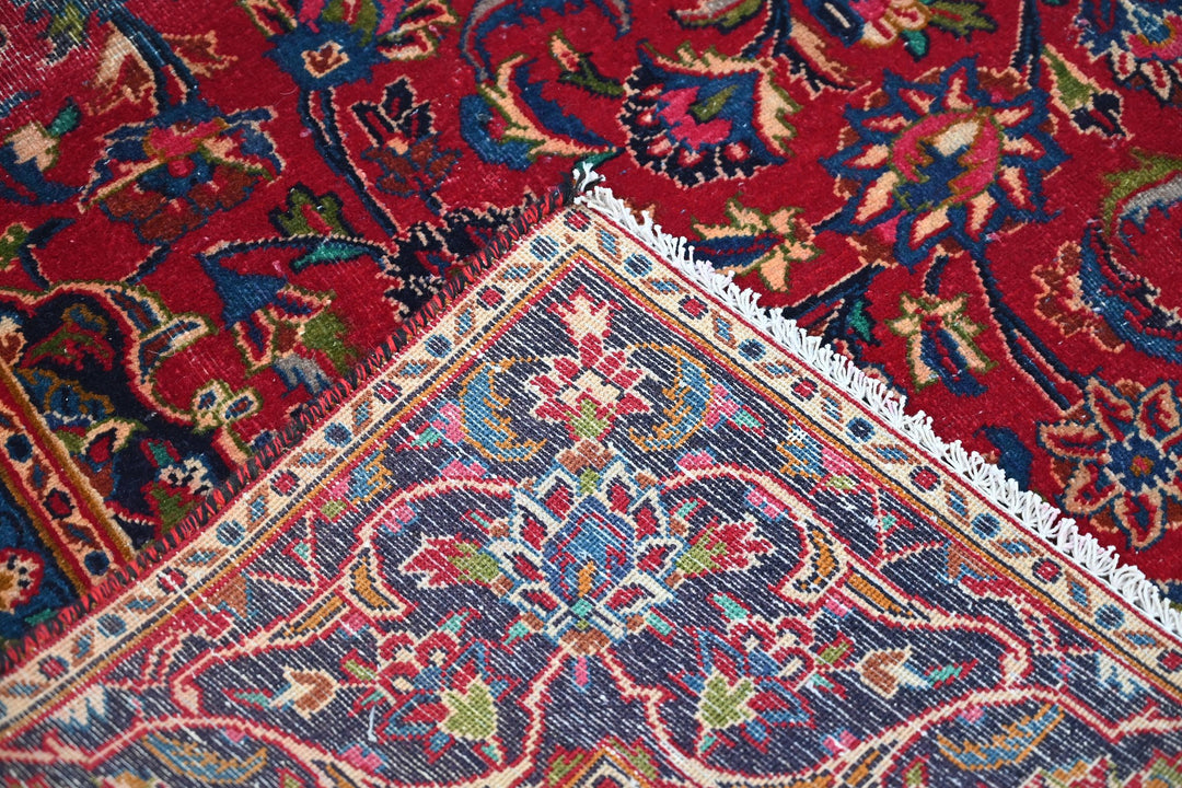 red Medium rug 5' 10" x 9' 0"