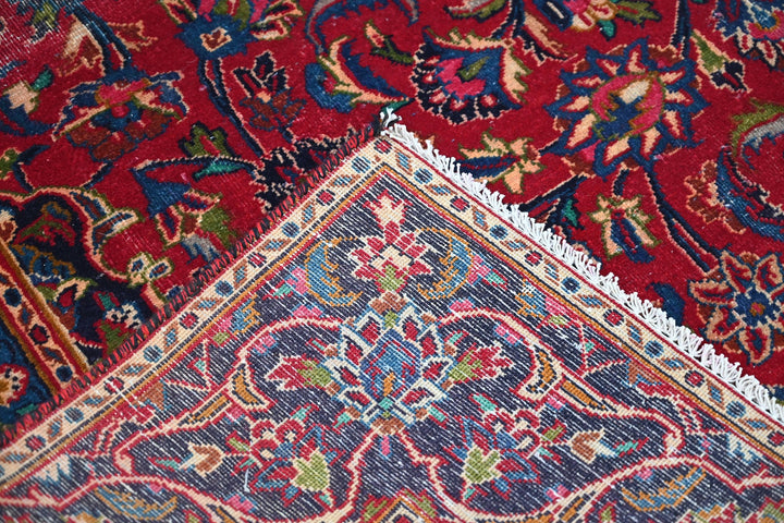 red Medium rug 5' 10" x 9' 0"