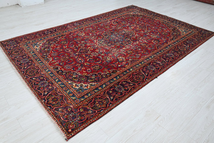 red Medium rug 5' 10" x 9' 0"