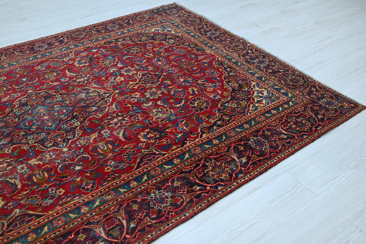 red Medium rug 5' 10" x 9' 0"