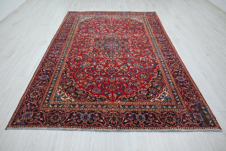 red Medium rug 5' 10" x 9' 0"