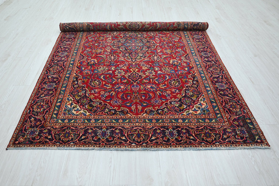 red Medium rug 5' 10" x 9' 0"
