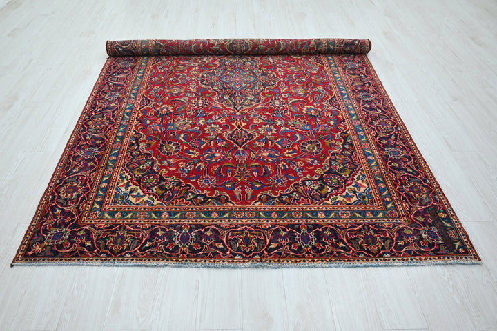 red Medium rug 5' 10" x 9' 0"