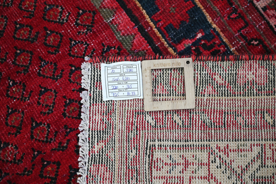 red Large rug 7' 3" x 10' 4"