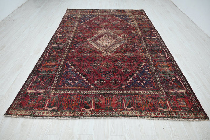 red Large rug 6' 10" x 10' 6"