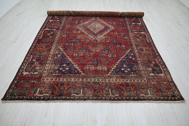 red Large rug 6' 10" x 10' 6"