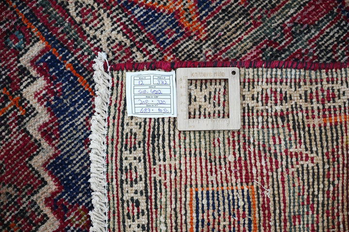 red Large rug 6' 10" x 10' 6"