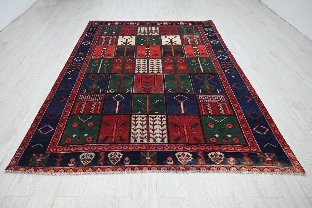 red Medium rug 6' 5" x 9' 1"
