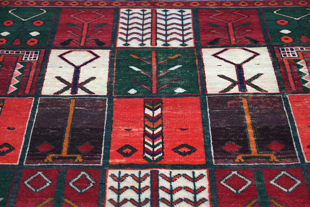 red Medium rug 6' 5" x 9' 1"